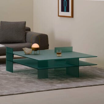 Exceptional Glas Italia Kazimir table crafted in teal tempered glass with double-sided acid-etched finish and unique interlocking design