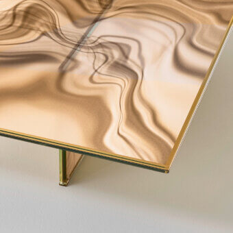 Exceptional Glas Italia Liquefy coffee table crafted in tempered extralight glass with veined decoration and whisky tone painted frame