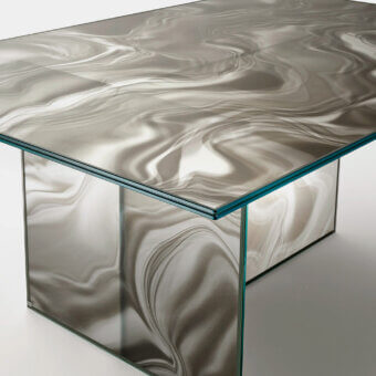 Captivating Glas Italia Liquefy table crafted in tempered extralight glass with swirling neutral gray and beige veining plus an anthracite grey frame