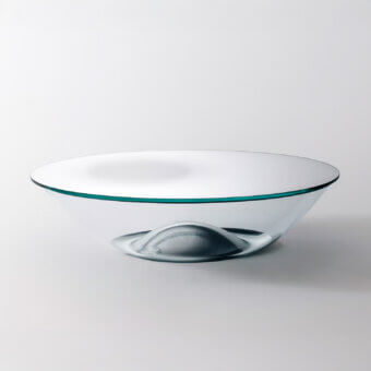 Distinguished Glas Italia Nacre table sculpted from transparent extralight glass with mirrored bottom and refined mirror finish