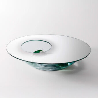Distinguished Glas Italia Nacre table sculpted from transparent extralight glass with a mirrored bottom and refined mirror finish