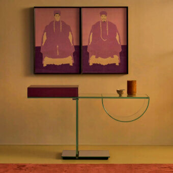 Distinguished Glas Italia Ollie console with laminated extralight glass and reddish-purple glossy lacquer drawer, supported by a mirror base