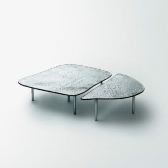 Exceptional Glas Italia Specchio di Venere table with uniquely shaped silvered glass and slender silver-toned metal legs