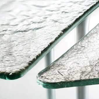 Stunning Glas Italia Specchio di Venere table with poured silvered glass and organically shaped surface in a matte clear finish