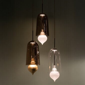Distinguished melogranoblu Ghanta suspension lamp crafted with hand-blown brown glass and a frosted white pendant