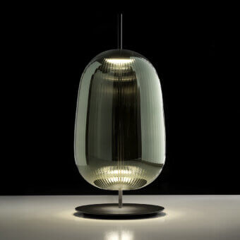 Exclusive melogranoblu Maat table lamp handcrafted from hand-blown glass with a pleated effect and glossy smoky gray-green shade