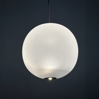 Distinguished melogranoblu Mahidevran suspension lamp with handblown ruled glass and matte finish emitting a warm glow