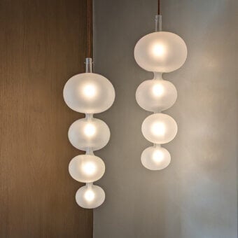 Superior melogranoblu Serendipity suspension lamp with stacked frosted glass spheres and light-colored metal crafted with a smooth matte finish