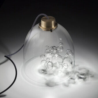 Distinguished melogranoblu Soap table lamp crafted in transparent hand-blown glass with delicate bubble glass sculpture and golden metal accents