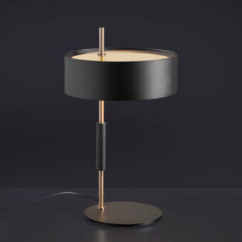 Superior Oluce 1953 lamp crafted in polished metal with a clear glass cylindrical shade and gracefully curved arm