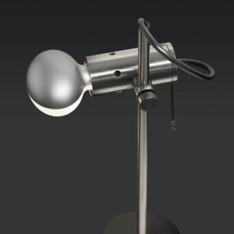 Superior Oluce Agnoli table lamp crafted in metal with a satin finish and graceful curved lines