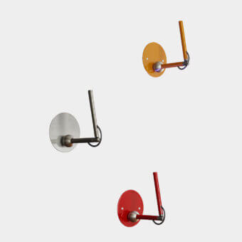 Exceptional Oluce Calamaio wall lamp crafted in metal with a mustard yellow finish and rotating head
