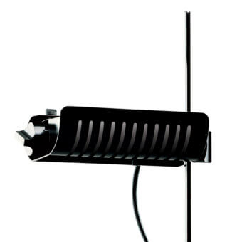 Superior Oluce Colombo floor lamp with black metal and chrome adjustable reflector delivers focused light with a smooth matte finish