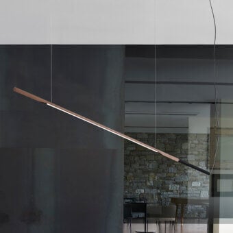 Oluce Ilo suspension lamp, wood veneer and black metal, rectangular form with integrated LED light, angled display against gray wall.