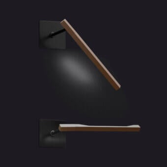 Elegant Oluce Ilo wall lamp crafted in aluminum with a warm wood-like emitting surface and matte gray-black finish