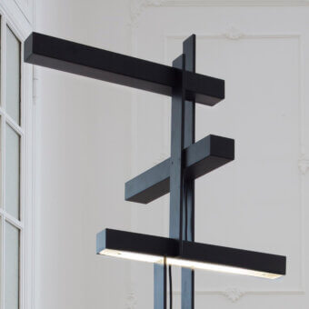 Superior Oluce Las floor lamp in sleek aluminum with matte black finish introduces a bold geometric presence and integrated LED sources
