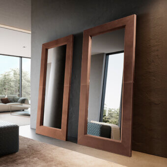 Exceptional Presotto Brera mirror with reddish-brown wood frame and subtle textural detailing in a matte finish