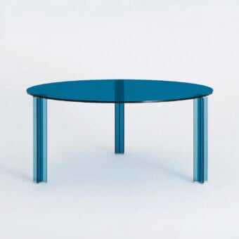 Exceptional Glas Italia X-T round table in blue paste glass with tempered glass legs and glossy finish