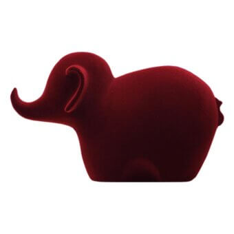 Burgundy elephant figurine with velvet texture, rounded form, curved trunk, and matte finish displayed on a white background.