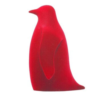 Red penguin figurine, velvety texture, matte finish, curved base, minimalist design, white background, stylized sculpture.
