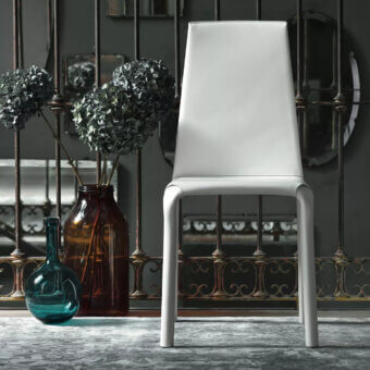 Exceptional Bontempi Alice chair crafted in bright white hide leather with a smooth matte finish and ergonomic curves