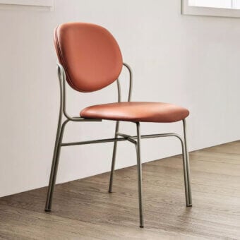Distinguished Bontempi Dada chair with reddish-brown upholstery and matte grey metal frame offers ergonomic support