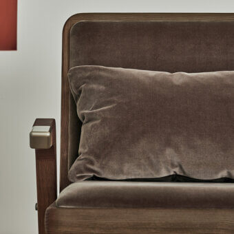 Distinctive Bontempi Lady Lounge chair in dark velvety brown textile with medium-brown satin-finish wood frame