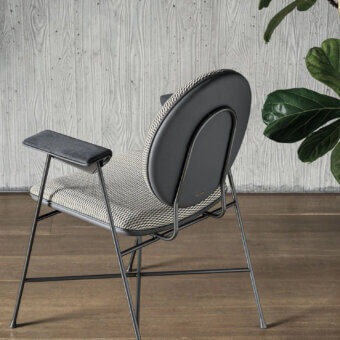 Elegant Bontempi Penelope chair with curved form, neutral beige and black geometric textile, plus satin-finish metal frame