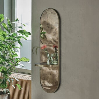 Superior Bontempi Pill Mirror wall décor with warm gold-toned metal framing and mirrored glass surface