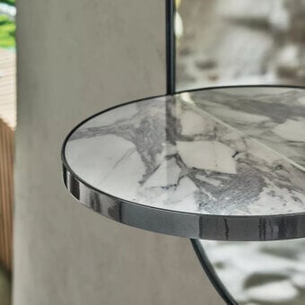 Superior Bontempi Pill Mirror wall décor with marble-patterned surface and dark glossy metallic border crafted with an elegant storage shelf