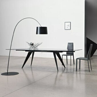 Distinguished Bontempi Ramos table with tinted glass tabletop and dark matte metal base embodies minimalist design