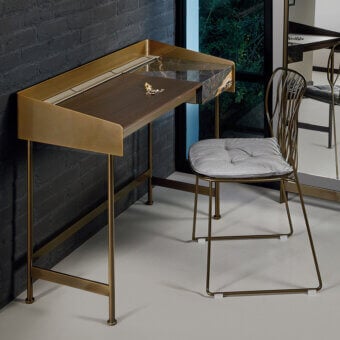 Exceptional Bontempi Secret vanity desk with warm medium-brown wood and brassy gold-toned metal framing a geometric design