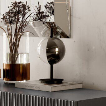 Distinguished Bontempi Sferatus lamp with smoky grey glass shade and matte black metal base crafted in refined Italian design