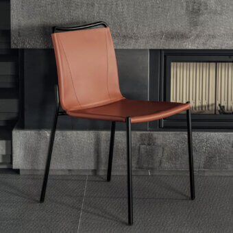 Distinguished Bontempi Shape chair with sleek angular silhouette and reddish-brown leather-like textile crafted with a matte dark metal frame