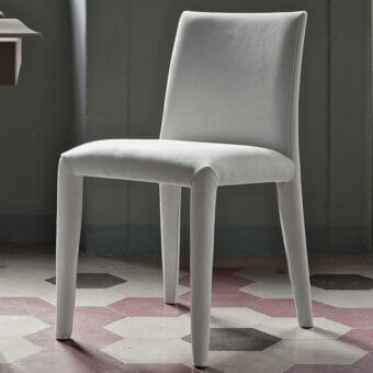 Superior Bontempi Sofia chair with fully upholstered construction and subtly textured light gray textile material
