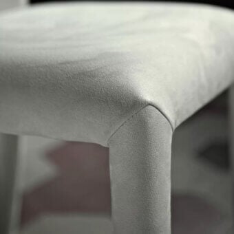 Distinguished Bontempi Sofia chair with fully upholstered construction in light gray textile and textured matte finish