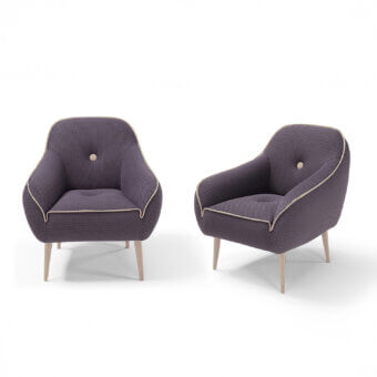Distinctive Egoitaliano Bebop lounge chair with vibrant purple and white geometric stretch fabric upholstery and a wood frame