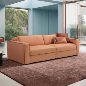 Exceptional Egoitaliano Kuby sofa with warm orange leather upholstery, adjustable mechanisms and refined piping details
