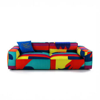 Exceptional Egoitaliano Plaza sofa with vibrant patchwork textile upholstery and wood combined construction