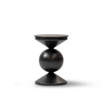 Distinctive Mascheroni Caramella side table crafted in wood with a muted dark gray matte finish and flowing lines