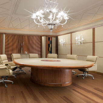 Distinguished Mascheroni Giubileo round conference table with reddish-brown leather tabletop and wood base in satin finish