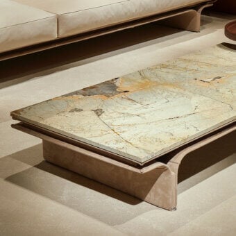 Exceptional Mascheroni Jazz John coffee table with Patagonia marble top and light-tan leather crafted base with polished steel feet