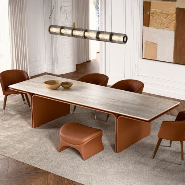 Captivating Mascheroni Jazz Louis table crafted in Travertine with sculpted base and reddish-brown leather upholstery
