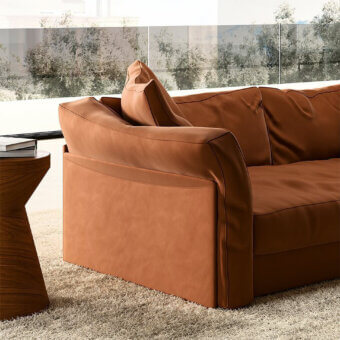 Superior Mascheroni Patrimonio sofa with reddish-brown leather upholstery and generous padding built with a robust solid wood frame