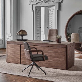 Sophisticated Porada Agea desk crafted with solid canaletta walnut in medium-brown tones and satin finish featuring integrated cabinetry