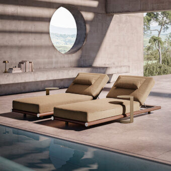 Distinguished Rugiano Amalfi sunbed with a plush fabric cushion and beautifully stained mahogany wood frame with chrome details and satin sheen