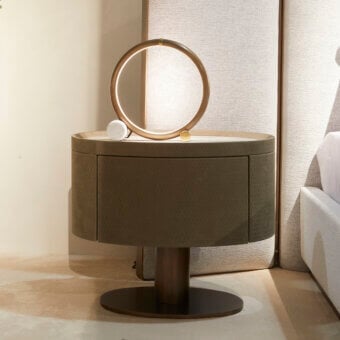 Exceptional Rugiano Beverly nightstand with softly rounded olive green leather upholstery and varnished satin bronze base