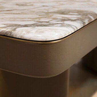 Elegant Rugiano Emily desk with warm grey leather and a refined marble top, accented with bronzed brass detailing