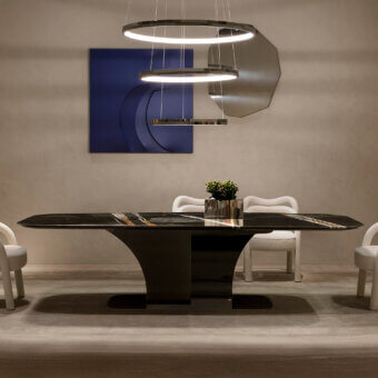 Exceptional Rugiano Spectro table with broad dark marble surface and uniquely formed matte bronze base