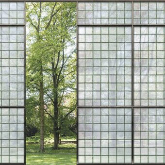 Architectural Adriani e Rossi Views wallpaper presents a stunning geometric grid with translucent glass panels in a pale gray cement base